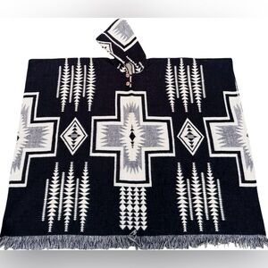 Native Alpaca Wool Poncho with geometric patterns.